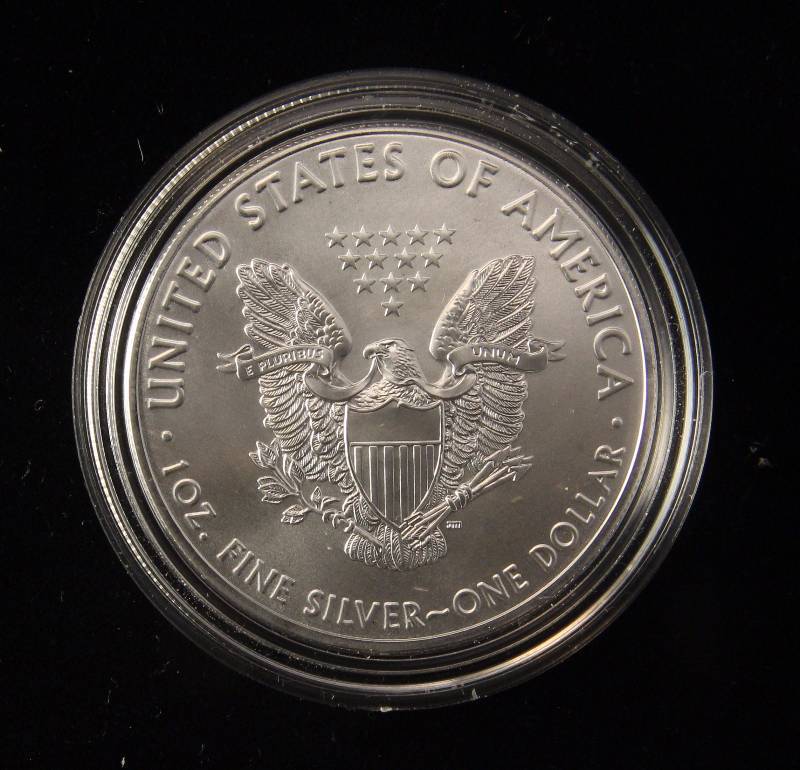 lot 158 image: 2016 AMERICAN SILVER EAGLE 1 TROY OZ. .999 FINE SILVER DOLLAR IN AIRTITE HOLDER