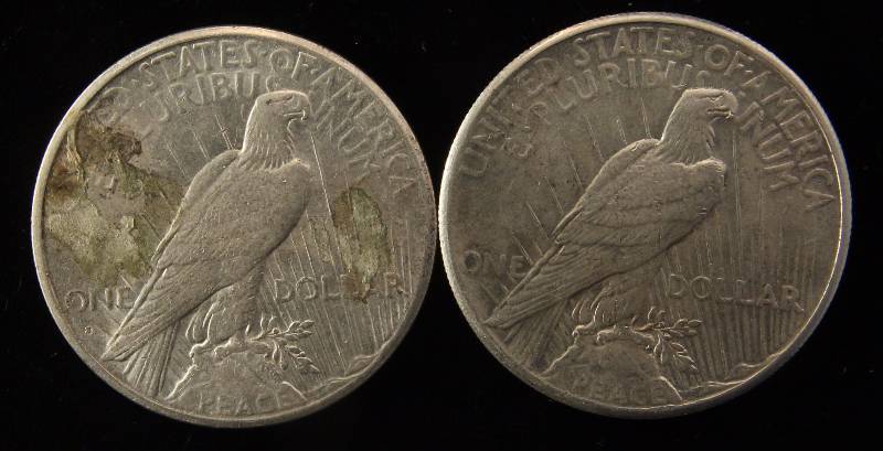 lot 131 image: GROUP OF 2 PEACE SILVER DOLLARS AS PICTURED XF DETAILS