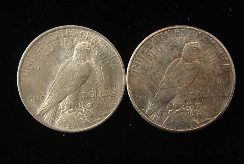 lot 133 image: GROUP OF 2 PEACE SILVER DOLLARS AS PICTURED AU-UNC