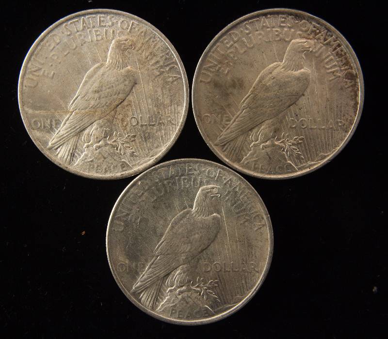 lot 154 image: GROUP OF 3 PEACE SILVER DOLLARS AS PICTURED AU-UNC
