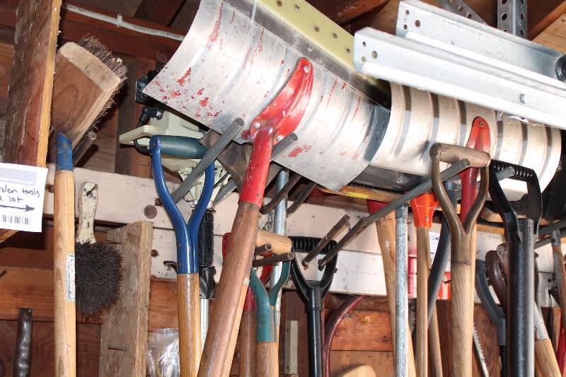 lot 78 image: Snow Shovels, Shovels, Hand Saws, And More