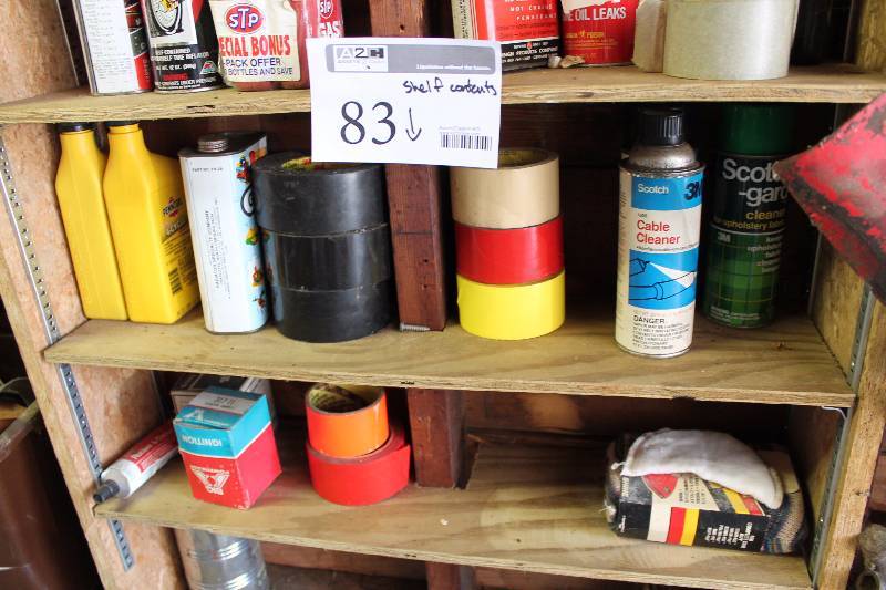 lot 83 image: Various Rolls of Tape, 4-Cycle Oil, Upholstry Cleaner, Cable Cleaner, And More