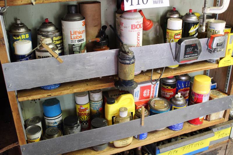 lot 110 image: Automotive Chemicals, Motor Oil, Brake Fluid, Oiler Cans, Measuring Tapes, And More