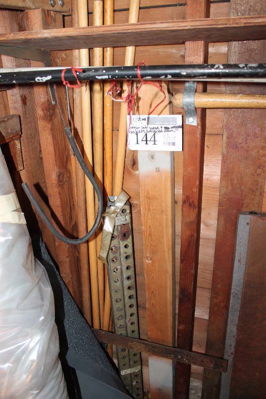 lot 144 image: Scrap Wood, Buckets of Sand, And More