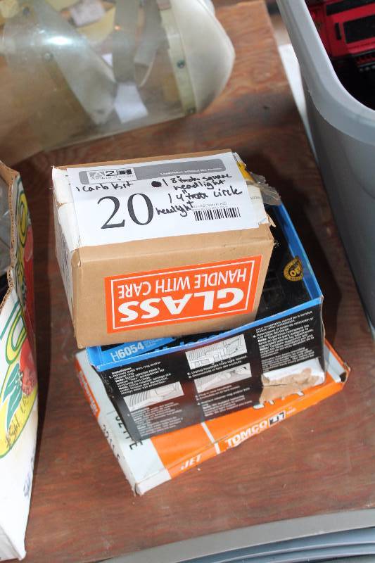 lot 20 image: Car Parts Includes Carburetor Kit, 8in. Head Light, 4in. Diameter Head Light
