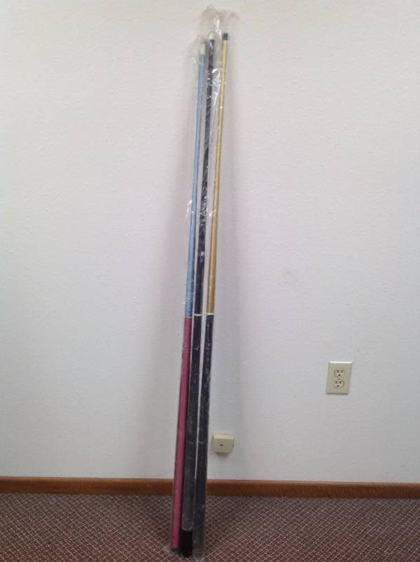 lot 6 image: Three new pool Sticks.