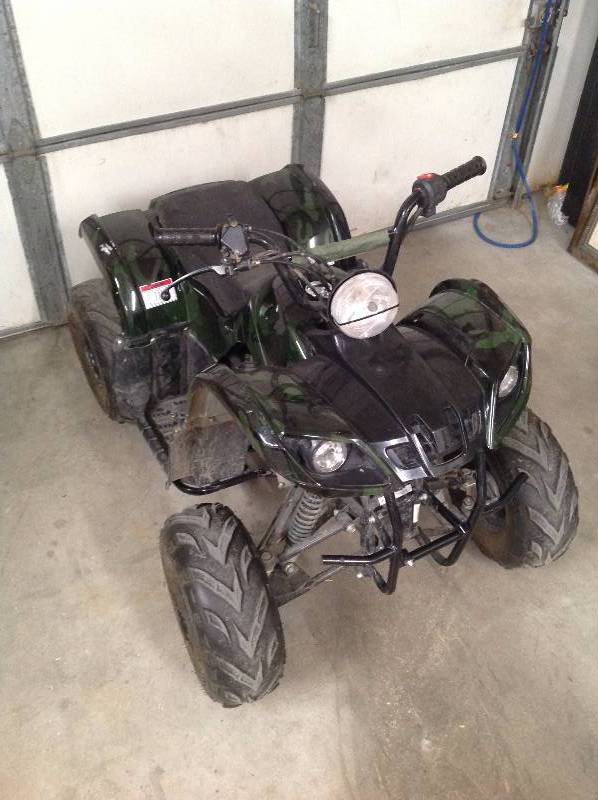 lot 65 image: Child 4 wheeler 125 cc