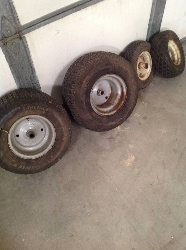 lot 75 image: 4 lawn mower tires with rims