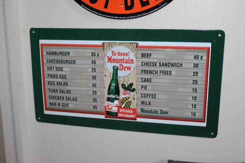 lot 30 image: Mountain Dew Metal Price Board