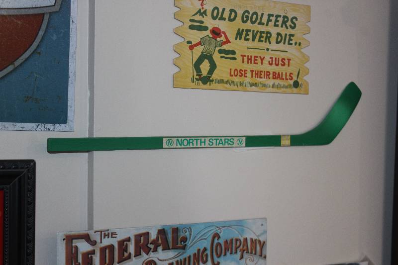 lot 50 image: Minnesota North Stars Wood Hockey Stick