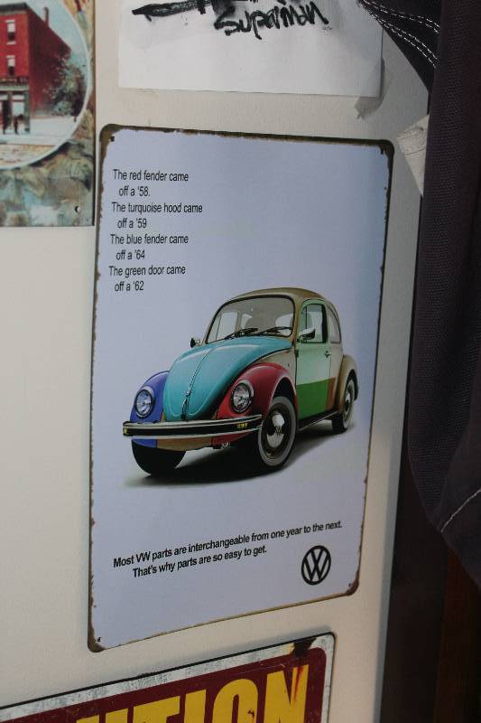 lot 53 image: VW Beetle Metal Sign