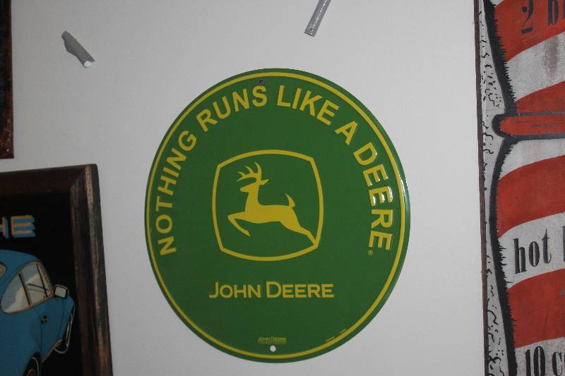lot 72 image: John Deere Nothing Runs Like A Deere Metal Sign