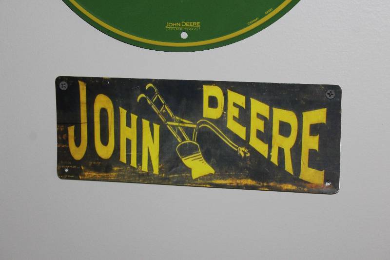 lot 73 image: John Deere Plow Metal Sign