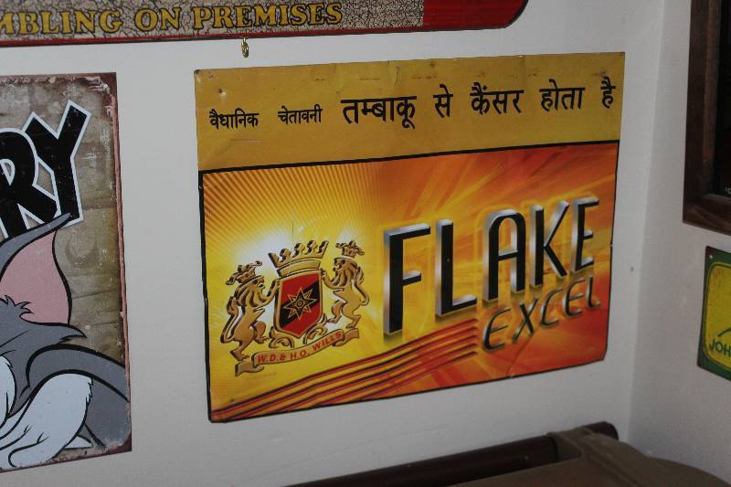 lot 79 image: Flake Excel Metal Sign