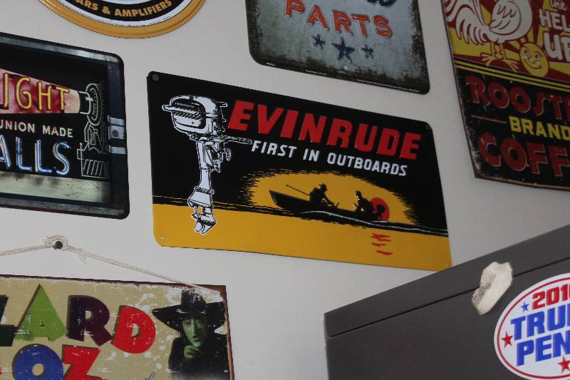 lot 87 image: Evinrude First In Outboards Metal Sign