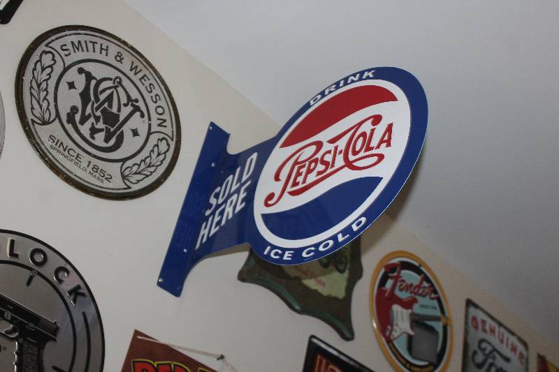 lot 95 image: Ice Cold Pepsi-Cola Sold Here Metal Sign