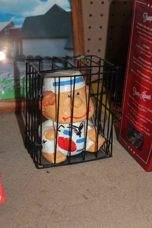 lot 138 image: Baby In Jail Table Art