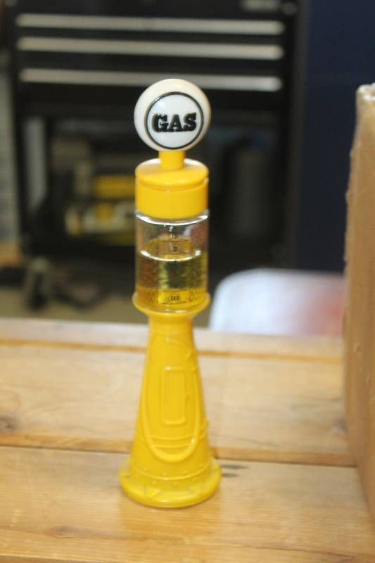 lot 214 image: Gasoline Pump Aftershave Lotion Bottle