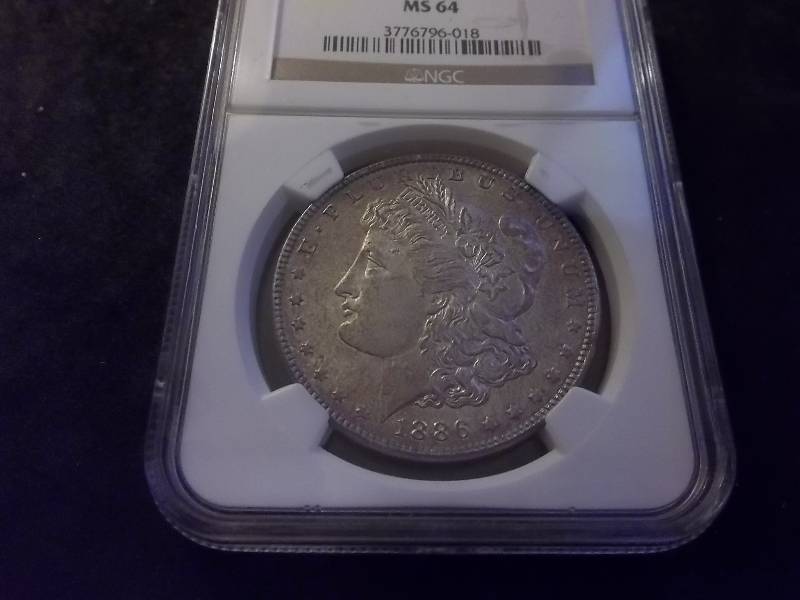 1886 Morgan Silver Dollar Very High Grade MS NGC Graded In Holder MS64