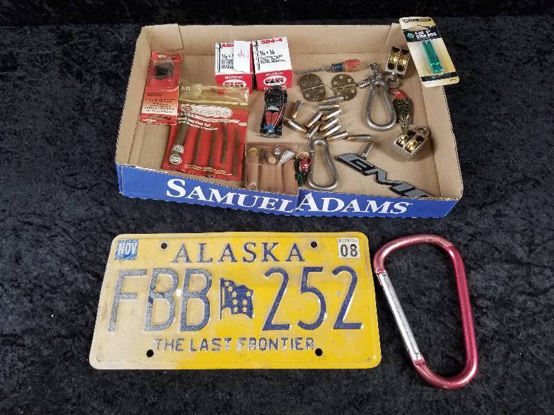 lot 68 image: Lot - Misc, Alaska License Plate, 9mm Ammo, Pulleys, Etc