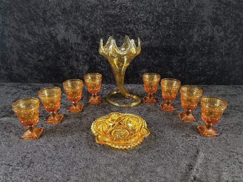 lot 75 image: Lot - Misc Vintage Amber Footed Glassware & Large Art Glass Swirled Vase