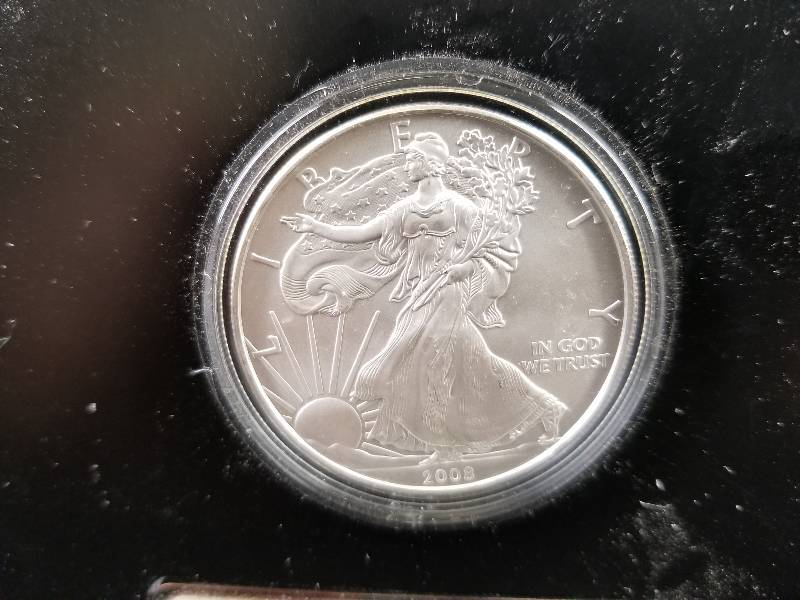 lot 1 image: 2008 Walking Liberty American Eagle Silver Dollar with Statue of Liberty Figure