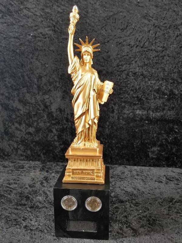 lot 7 image: Washington & Wilson  $1 Coins with Gold Toned Statue of Liberty Figure