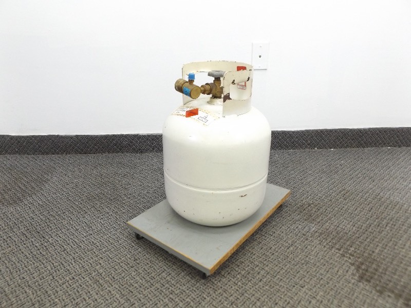 lot 8 image: 34 Full Propane Tank on Custom Rolling Wood Cart