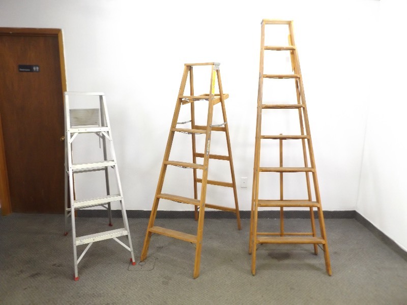 lot 11 image: 2 Wood Ladders and 1 Aluminum