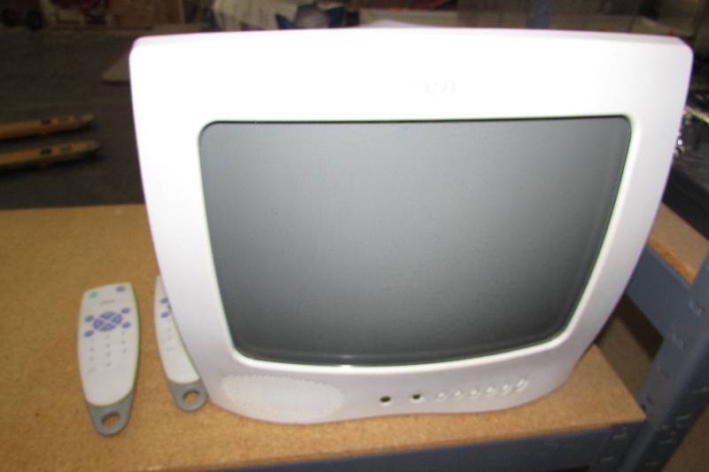 lot 229 image: RCA KITCHEN TELEVISION AND TWO REMOTES