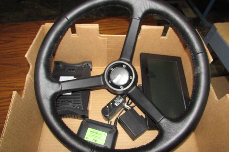lot 257 image: KONIG STEERING WHEEL, DIRECT TV BOX AND BEC TECHNOLOGIES BOX