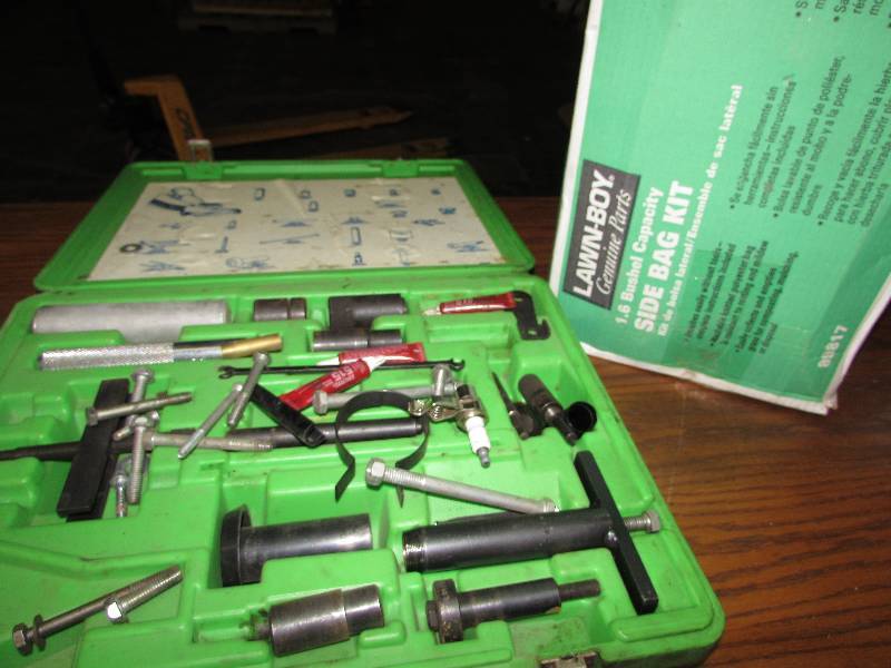 lot 263 image: LAWN BOY SIDE BAG KIT AND REPAIR KIT