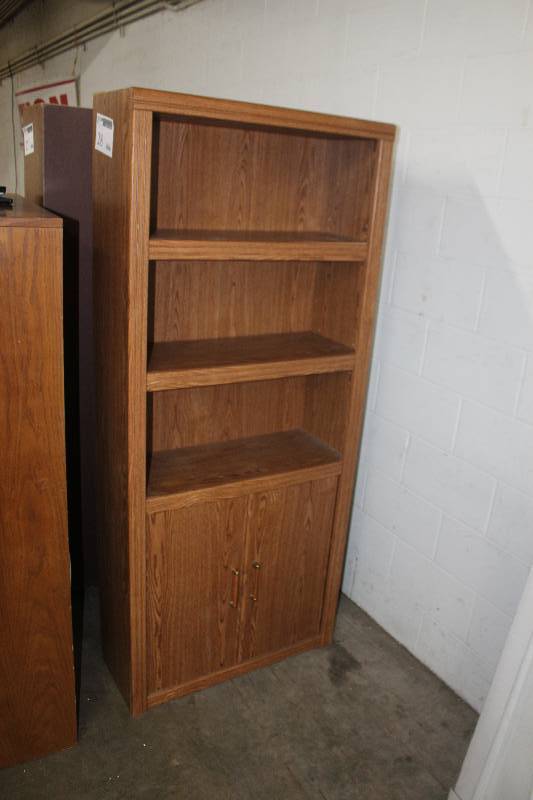 lot 28 image: 5-Shelf 2-Door Wood Bookcase
