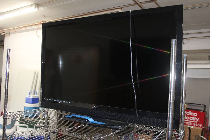 lot 29 image: Vizio 49in Flat Screen TV