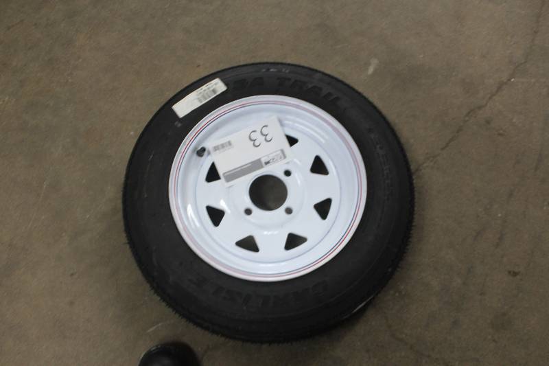 lot 33 image: Carlisle Tire w Wheel