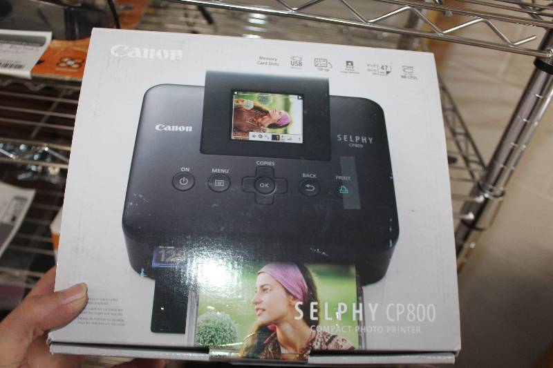 lot 208 image: Canon Selphy Compact Photo Printer