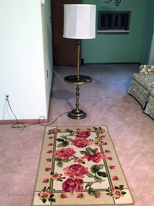 lot 38 image: Floor lamp and rug
