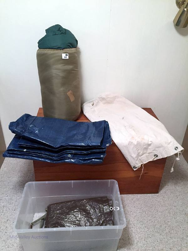 lot 79 image: Sleeping bag, tote, tarps..