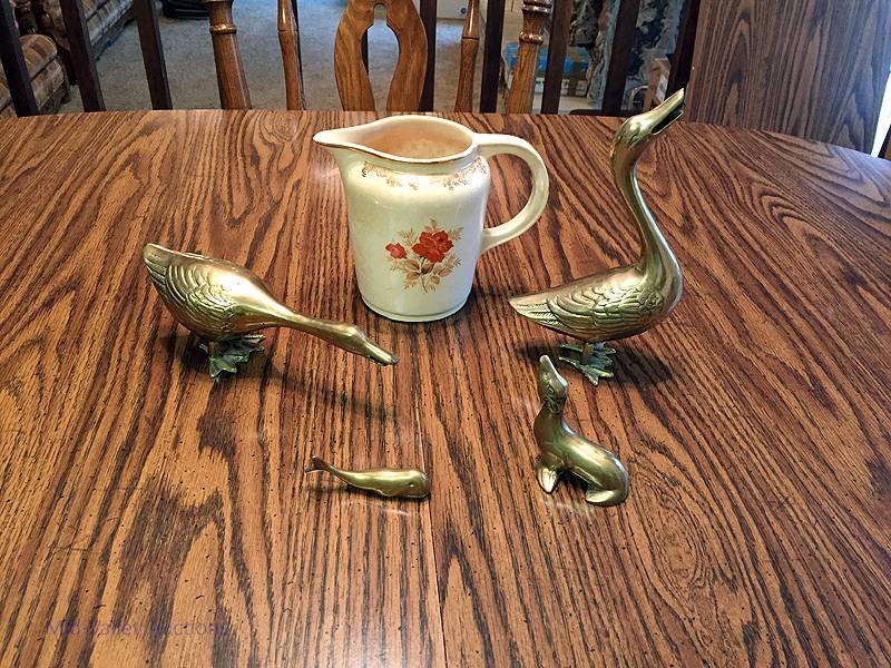 lot 90 image: Brass animals and pitcher