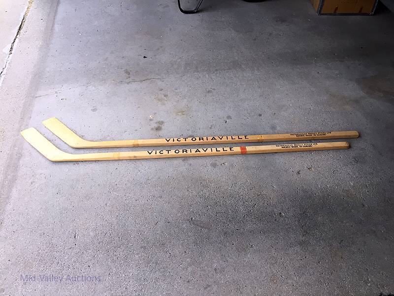 lot 121 image: Hockey Sticks