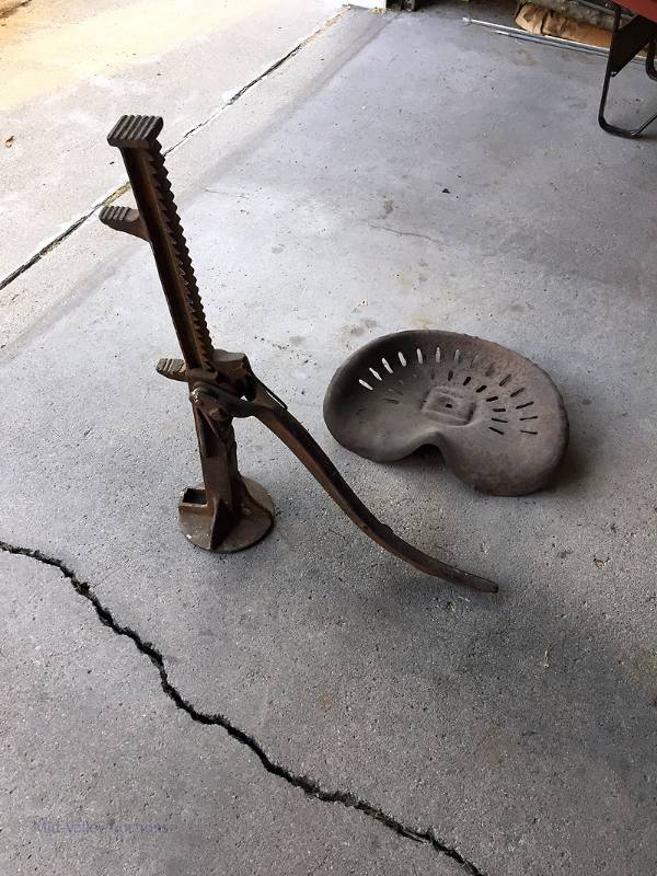 lot 125 image: Tractor seat and old jack