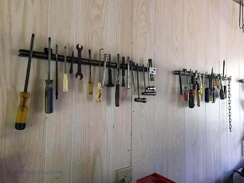 lot 137 image: 2 wall magnets & tools