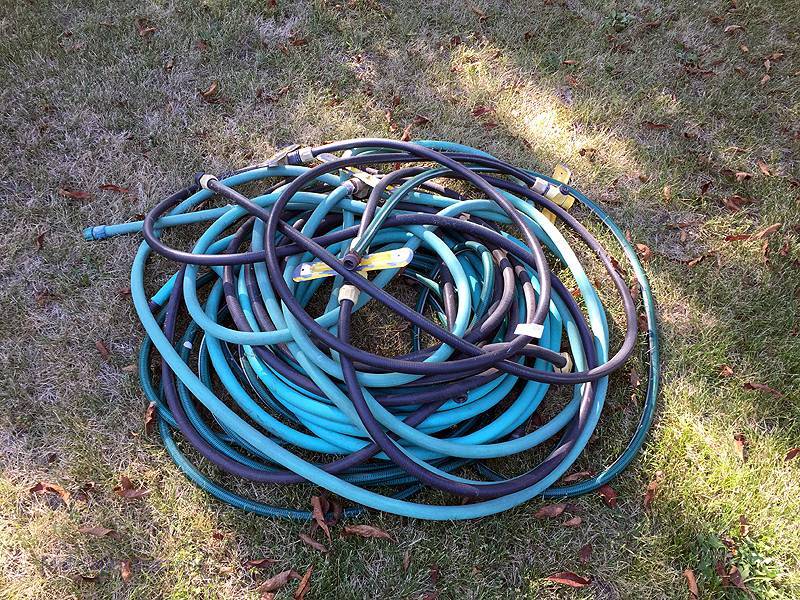 lot 159 image: Garden hose & sprinklers