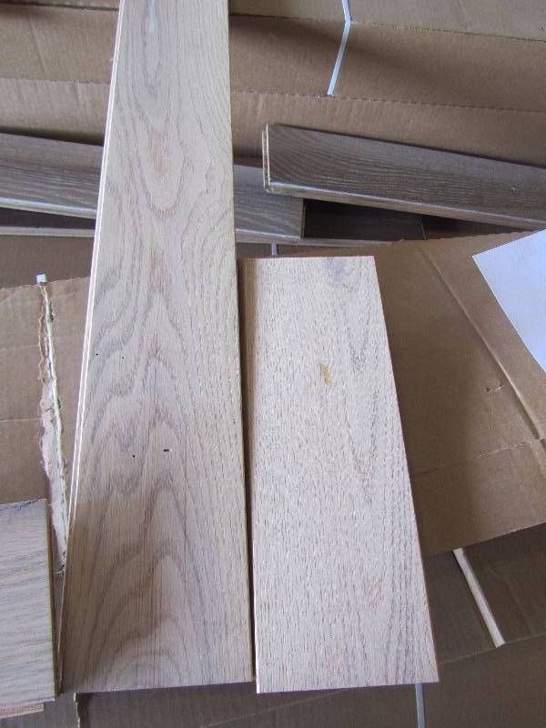 24 Boxes of Oak Ivory Cabin Grade Wood Flooring.