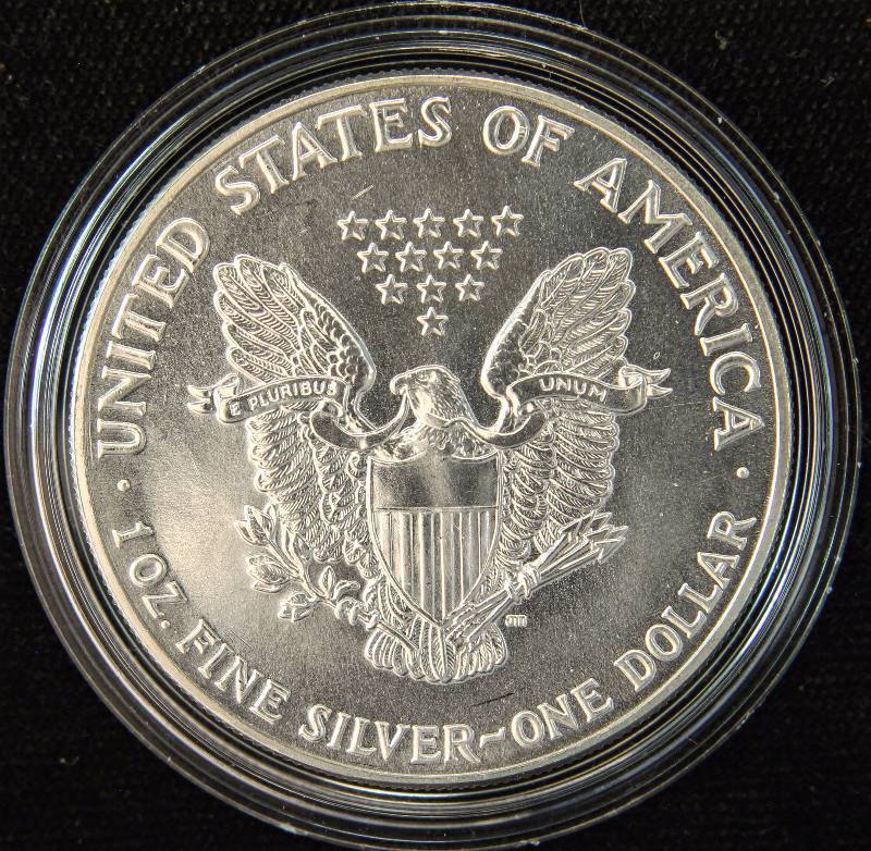 1987 AMERICAN SILVER EAGLE 1 TROY OZ. .999 FINE SILVER IN AIRTITE