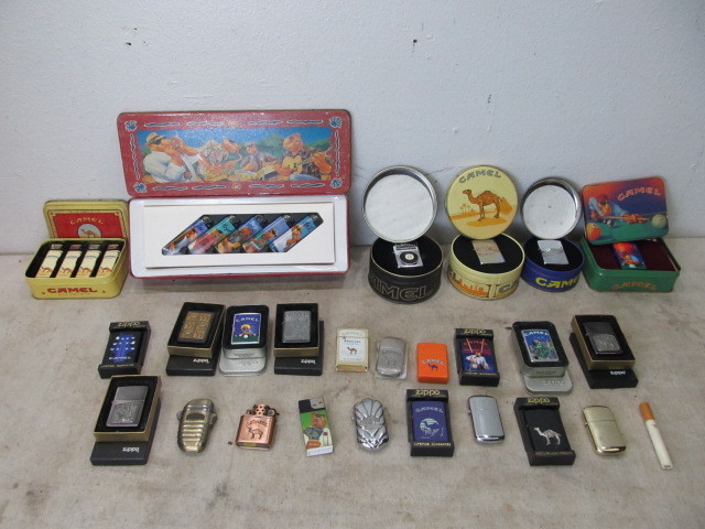 lot 16 image: Large Lot of CAMEL Zippos & Lighters