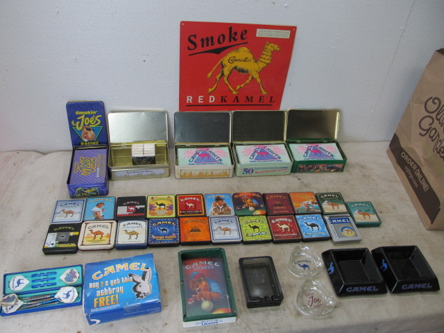lot 17 image: Large Lot of CAMEL Tins Matches & Embossed Metal Sign