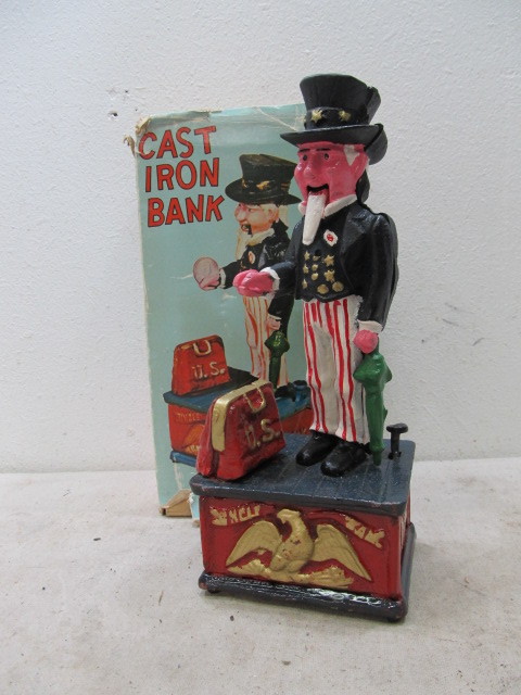 lot 40 image: Vintage Cast Iron UNCLE SAM Coin Bank wBox