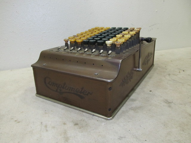 lot 48 image: Antique Copper Covered COMPTOMETER Adding Machine
