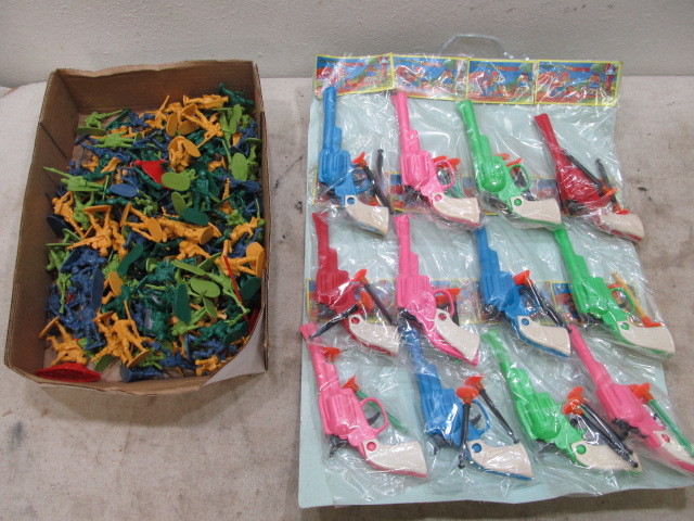 lot 88 image: Lot of Plastic Army Men & NEW Toy Dart Guns